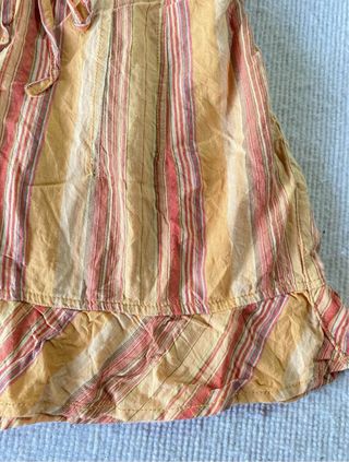 Top corto a righe arancione e giallo