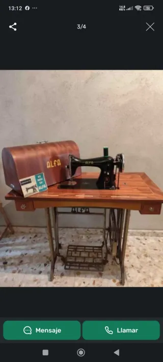 Máquina de coser Singer antigua con mesa