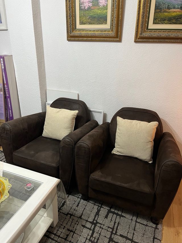 Pareja de sillones efecto piel vuelta