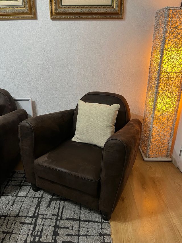 Pareja de sillones efecto piel vuelta