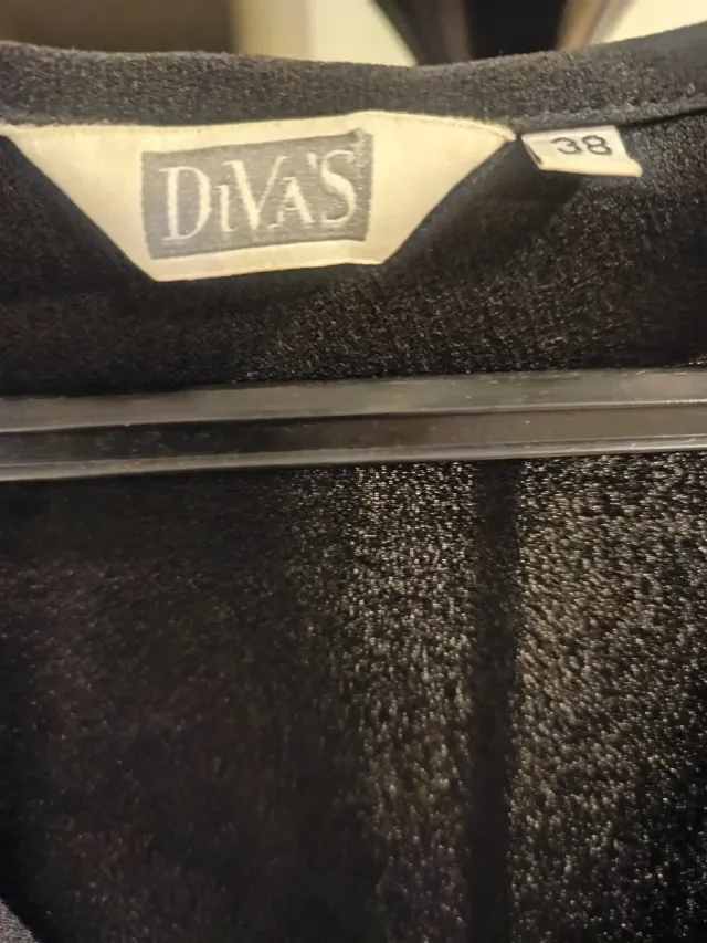 Blusa negra volantes talla M