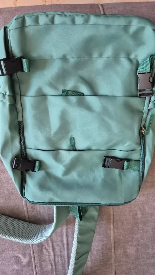 Mochila de viaje verde cabina