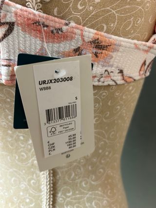 Top de bikini floral blanco y naranja