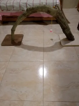 Tiragraffi in legno ad arco