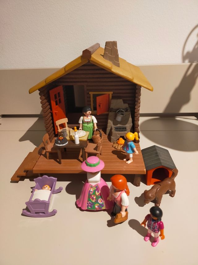 Cabaña de troncos Playmobil con figuras
