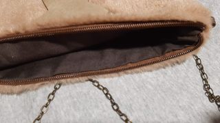Bolso pelo beige con estrella