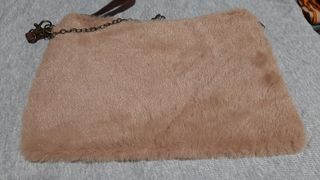 Bolso pelo beige con estrella