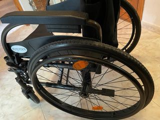 Silla de ruedas de aluminio.