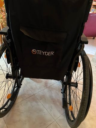 Silla de ruedas de aluminio.