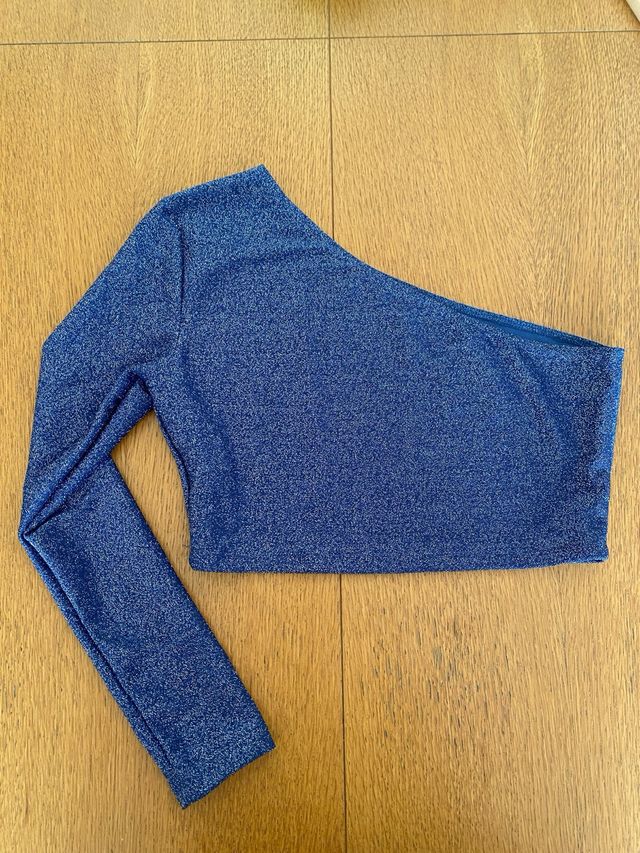 Top brillante azul manga larga