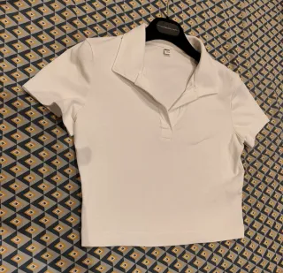 Polo corto Uniqlo mujer blanco.