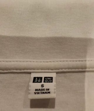 Polo corto Uniqlo mujer blanco.