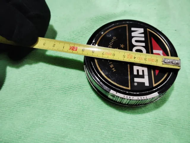 2 Latas Limpia Calzado Nugget Azul y negro.