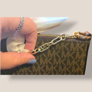 Mala Michael Kors castanha e dourada