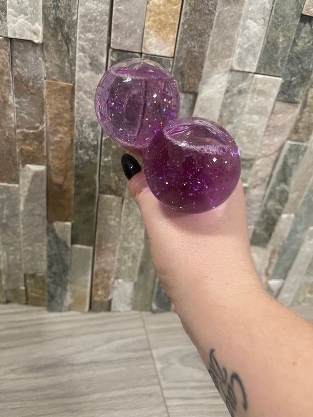 2 sfere massaggianti viso glitter viola