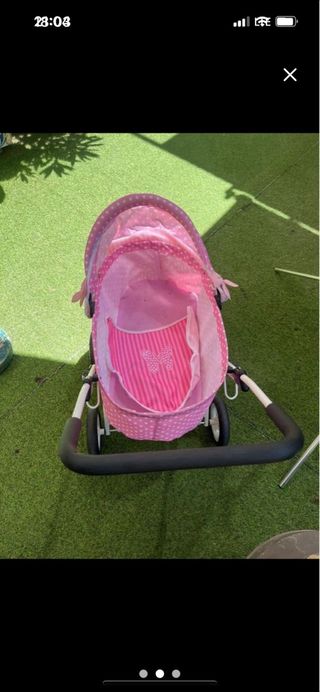 Carro de muñecas rosa