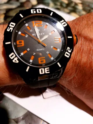 Reloj Nowley Negro Naranja a estrenar