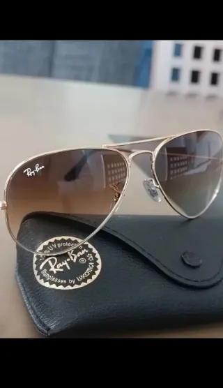 Gafas de sol Ray-Ban mujer doradas