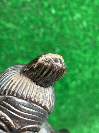 Figura tallada de madera antigua