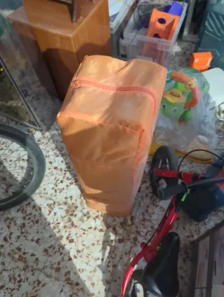 Cuna de viaje naranja