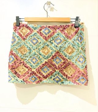 Falda mini lentejuelas multicolor
talla S 