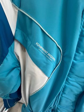 Tuta da neve blu e bianca