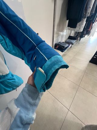 Tuta da neve blu e bianca