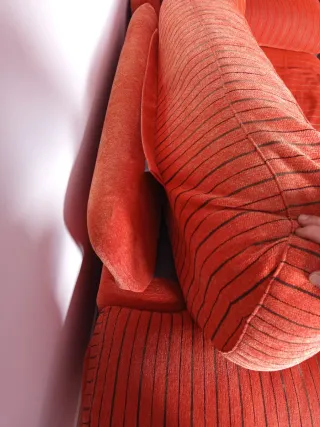 Conjunto de sofás de pana naranja