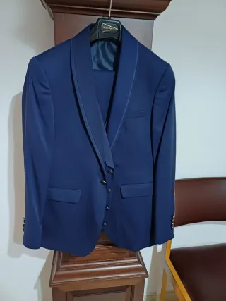 Traje de chaqueta y chaleco azul