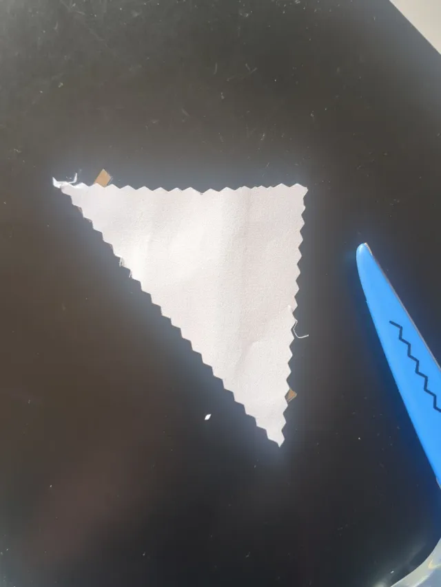 Tijeras de corte dentado