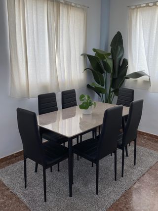 Mesa comedor con 6 sillas negras