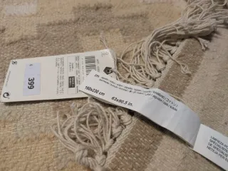 Alfombra de lana beige y marrón