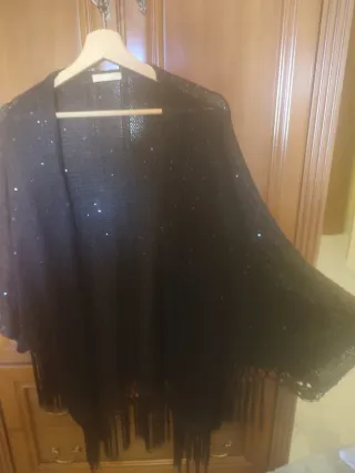 Rebeca negra brillos y flecos talla 54