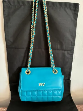 Bolso Roberto Verino azul y dorado