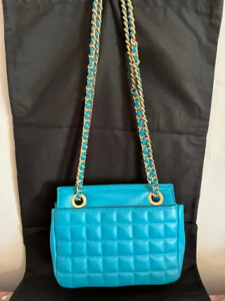 Bolso Roberto Verino azul y dorado