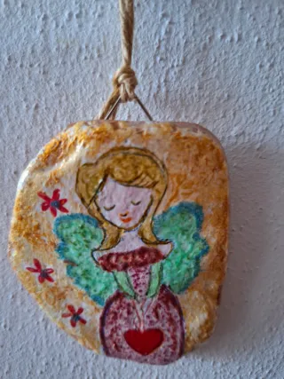 Angioletti dipinti su terracotta