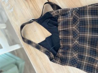 Abito midi a quadri con frange