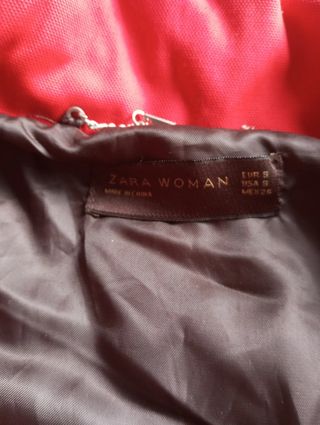 Cazadora técnica roja con cinturón