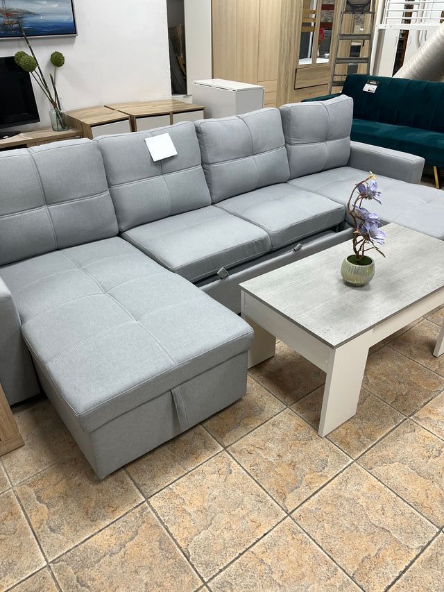 Sofá cama gris con 2 chaiselongue y arcón