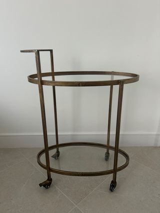 Carrello a barre metallico dorato con ruote