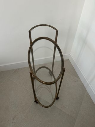 Carrello a barre metallico dorato con ruote