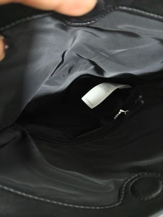 Mochila Desigual negra con flores azules