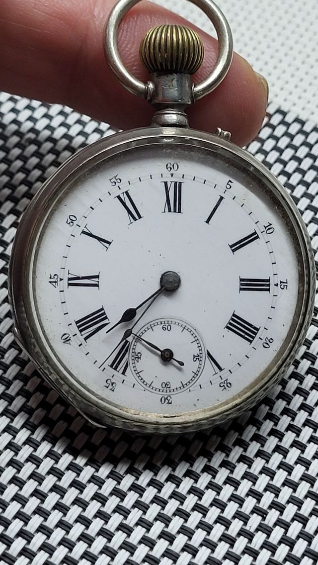 Reloj de bolsillo plata carga manual