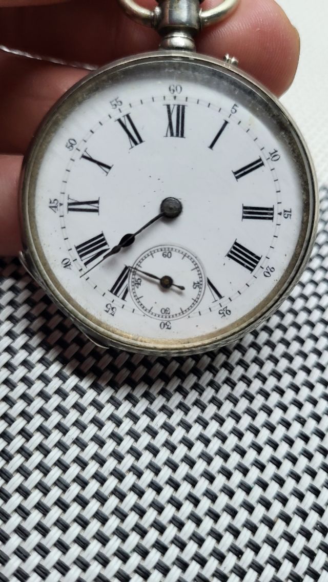 Reloj de bolsillo plata carga manual