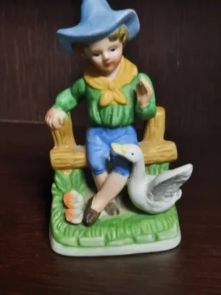 Statuetta pastorello con oca