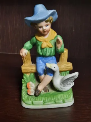 Statuetta pastorello con oca