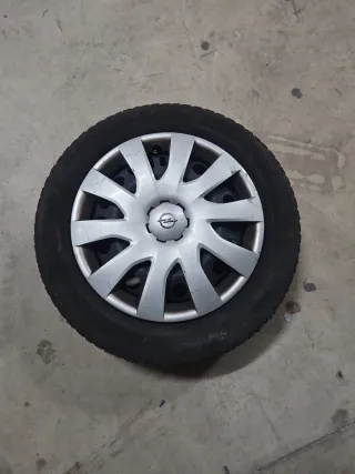 Llanta Opel con Tapacubos