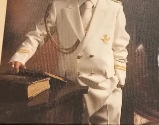 Traje de comunión blanco  dorado.