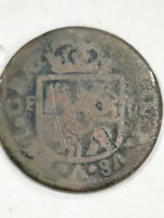 Seiseno de cobre acuñada en Valencia Felipe V