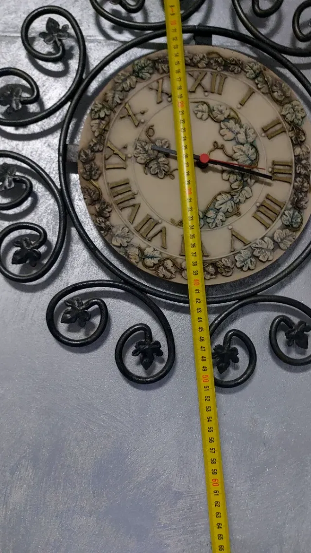 Orologio da parete in ferro e ceramica